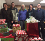 Adopt A Family - gift delivery. New Ulm employees